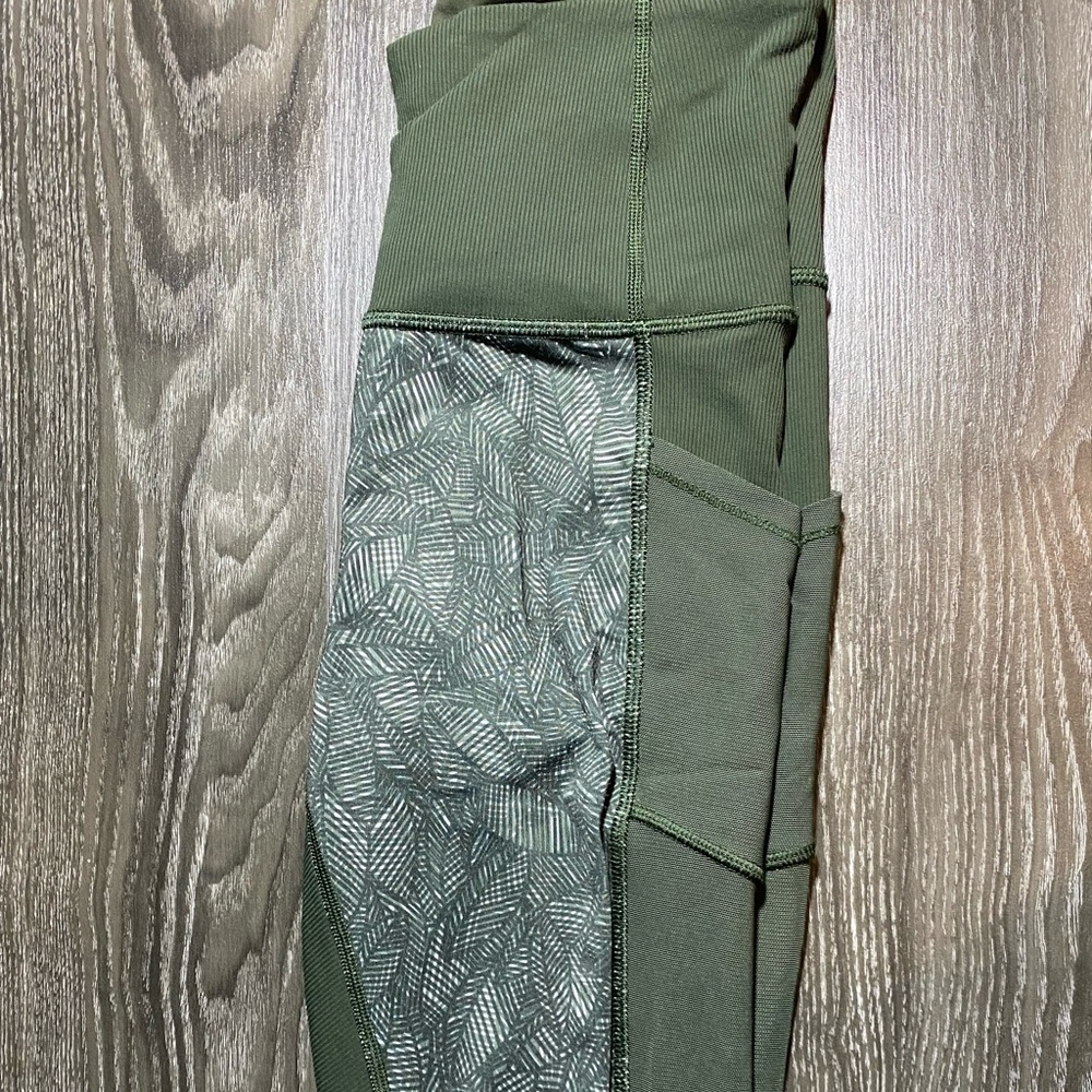 Lululemon “leaf” legging with pocket and mesh panels